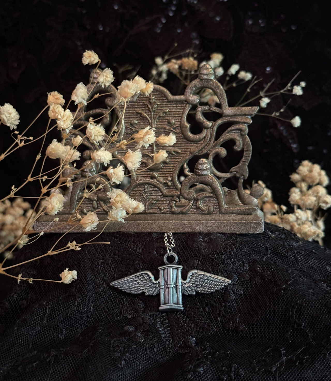 The Flying Hourglass Necklace