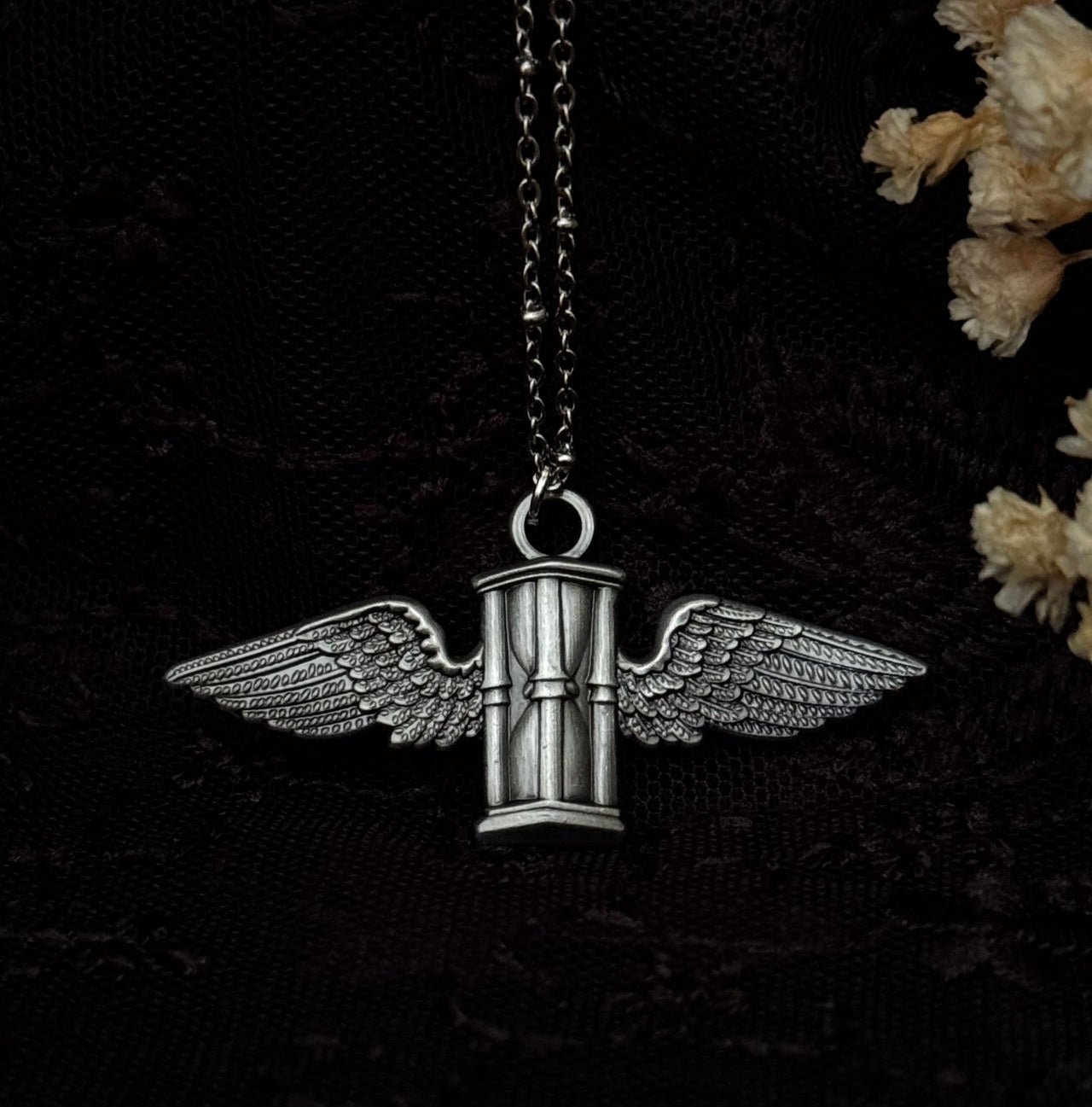 The Flying Hourglass Necklace